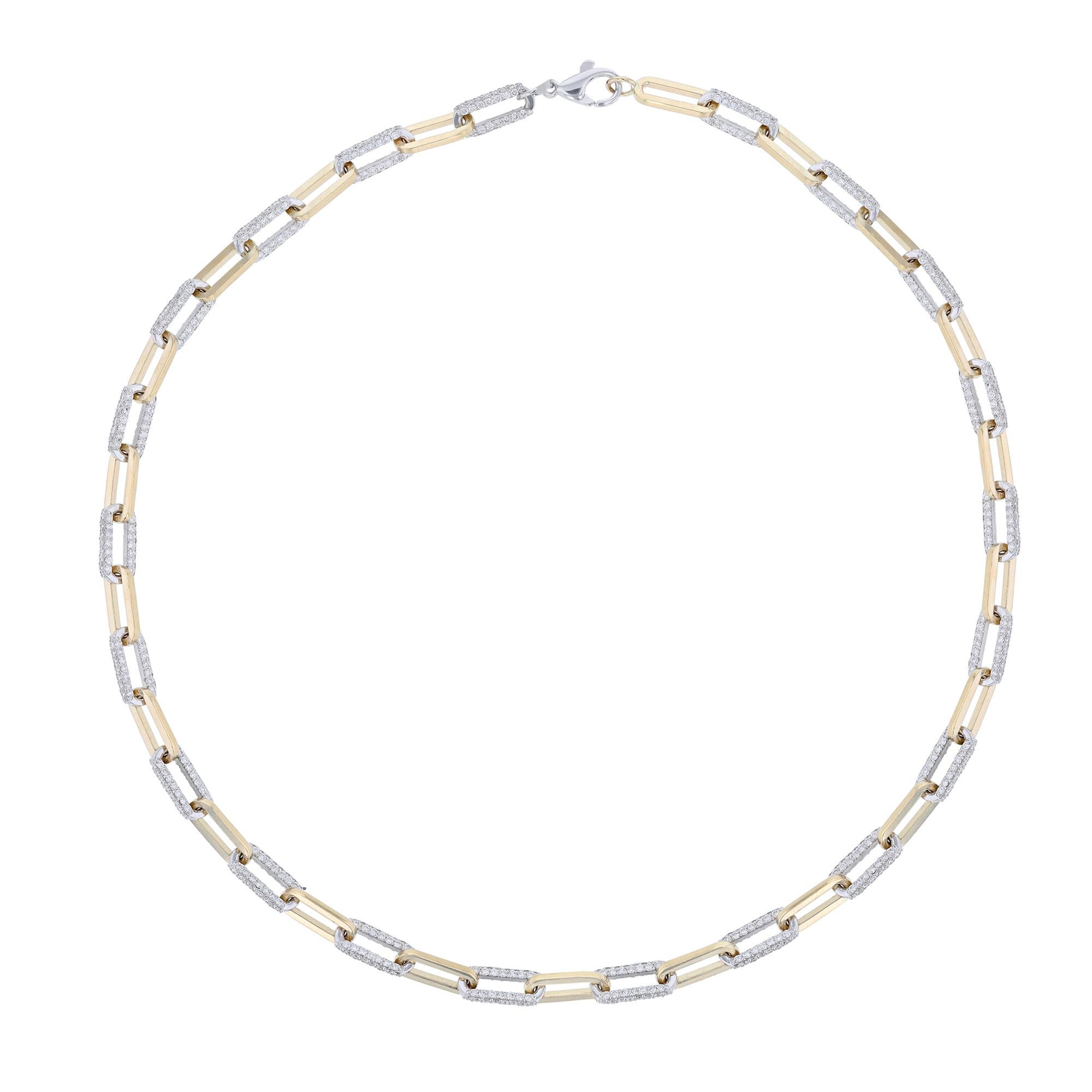 This paperclip necklace necklace is made in 14K yellow and white gold. It features 924 round cut diamonds weighing 7.80 carats combined. Necklace has a color grade (H) and clarity grade (SI2). Diamonds are prong set.