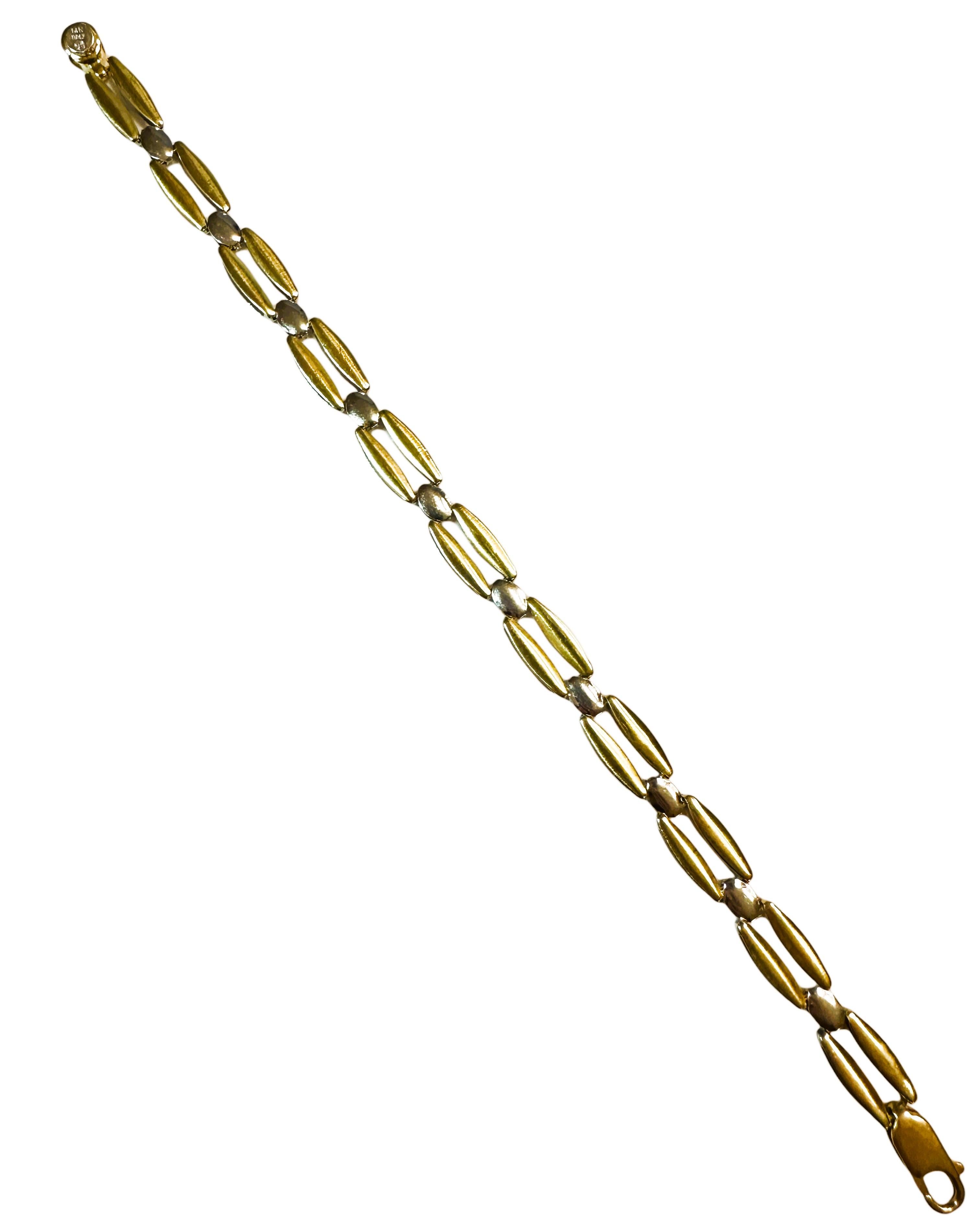 This bracelet is just gorgeous.  I love the design.  It is such a quality made piece made by Italian Jewelers and so versatile.  You can wear it on the side where it's 2-tone Yellow and White Gold or the other side which is just White Gold.  It is