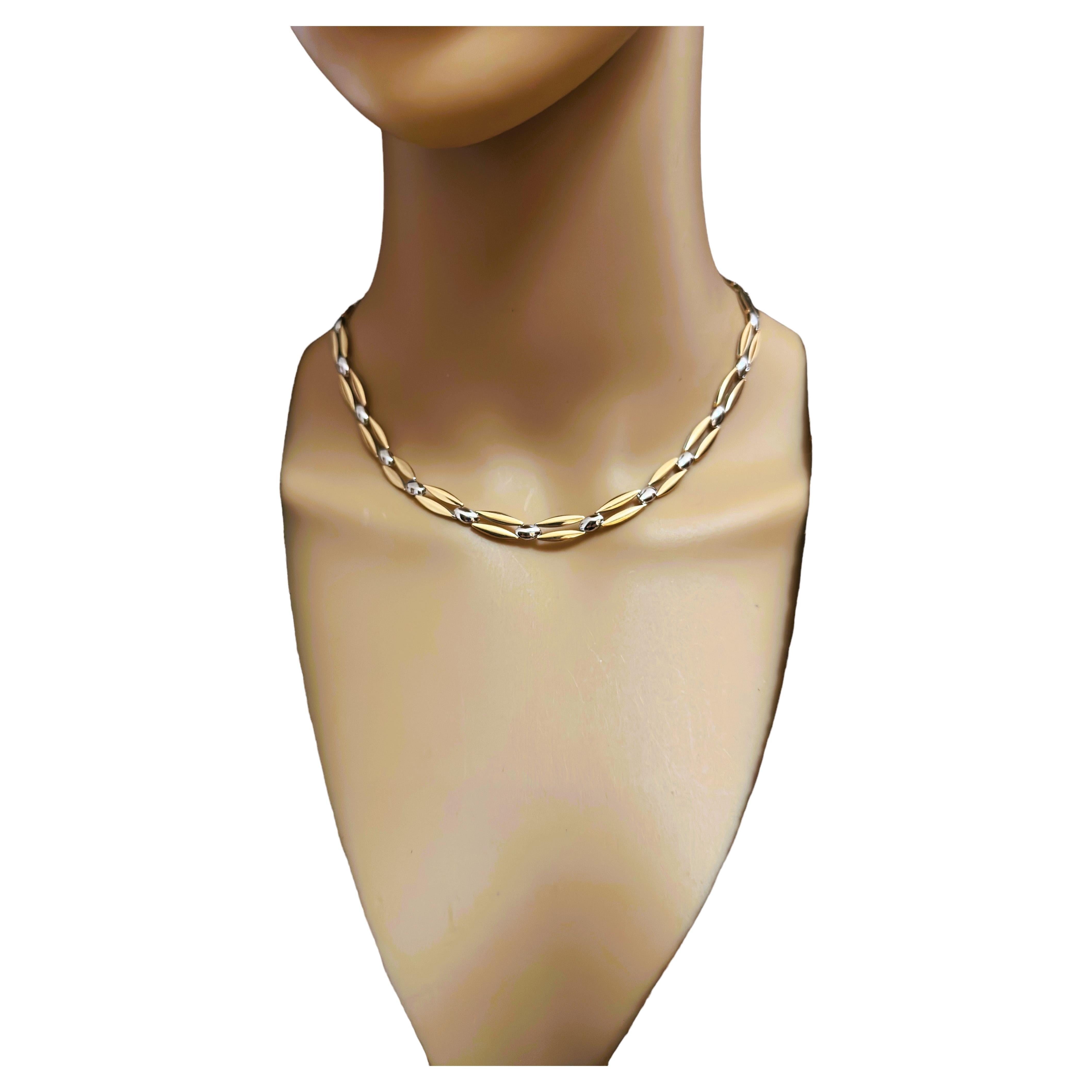 This necklace is just gorgeous.  I love the design.  It is such a quality made piece by Unoaerre Italian Jewelry Makers and so versatile.  You can wear it on the side where it's 2-tone Yellow and White Gold or the other side which is just Yellow