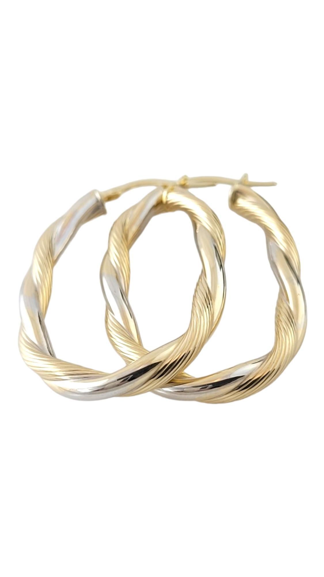 14K Yellow & White Gold Twisted Oval Hoops #16873

This beautiful set of large oval hoop earrings is in a gorgeous, twisted pattern crafted from 14K yellow and white gold!

Size: 38.6mm X 3.5mm X 2.7mm

Weight: 1.8 dwt/ 2.9 g

Hallmark: 14KT Italy