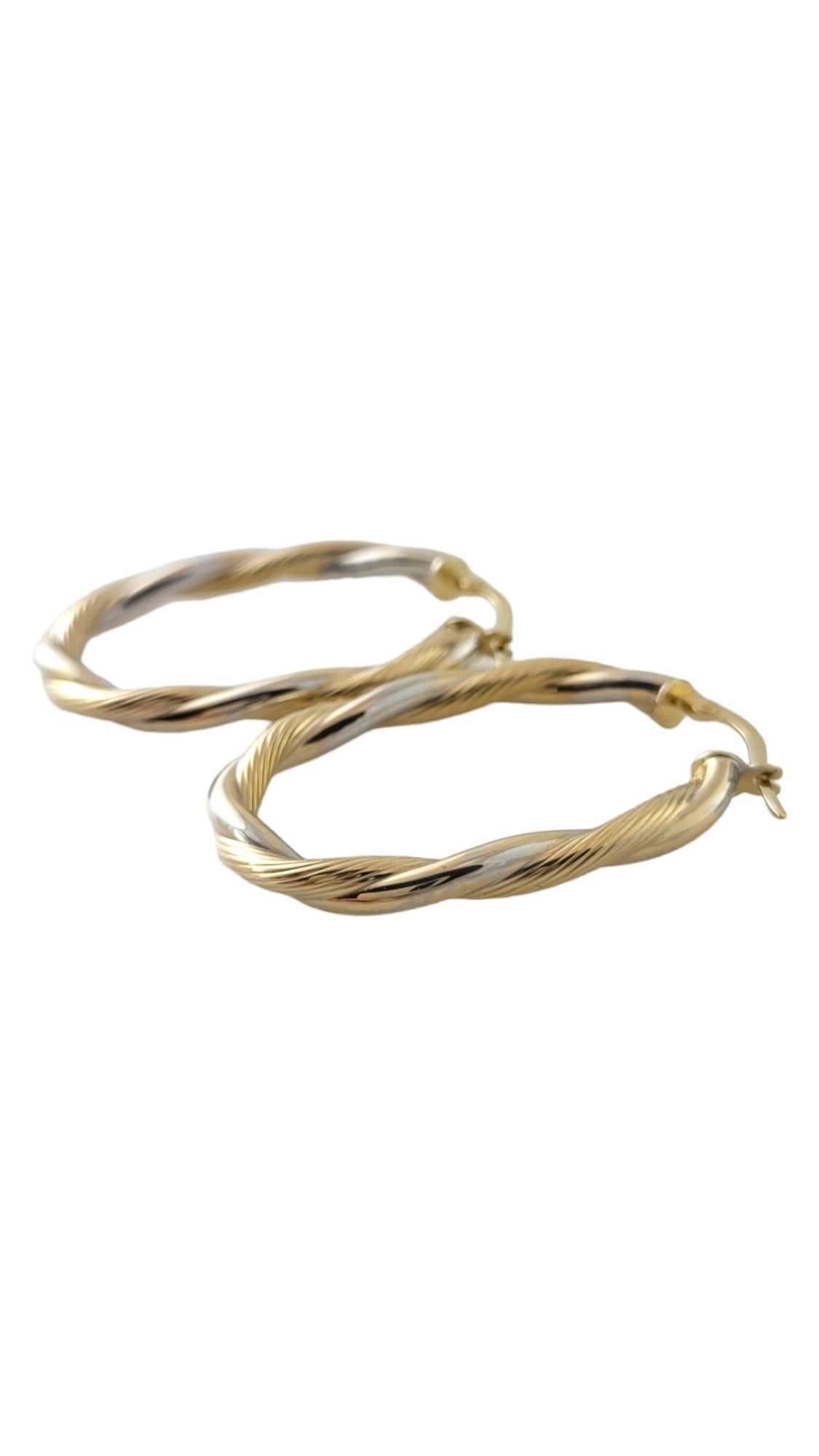 14K Yellow & White Gold Two Toned Twisted Oval Hoop Earrings #16873 In Good Condition In Washington Depot, CT