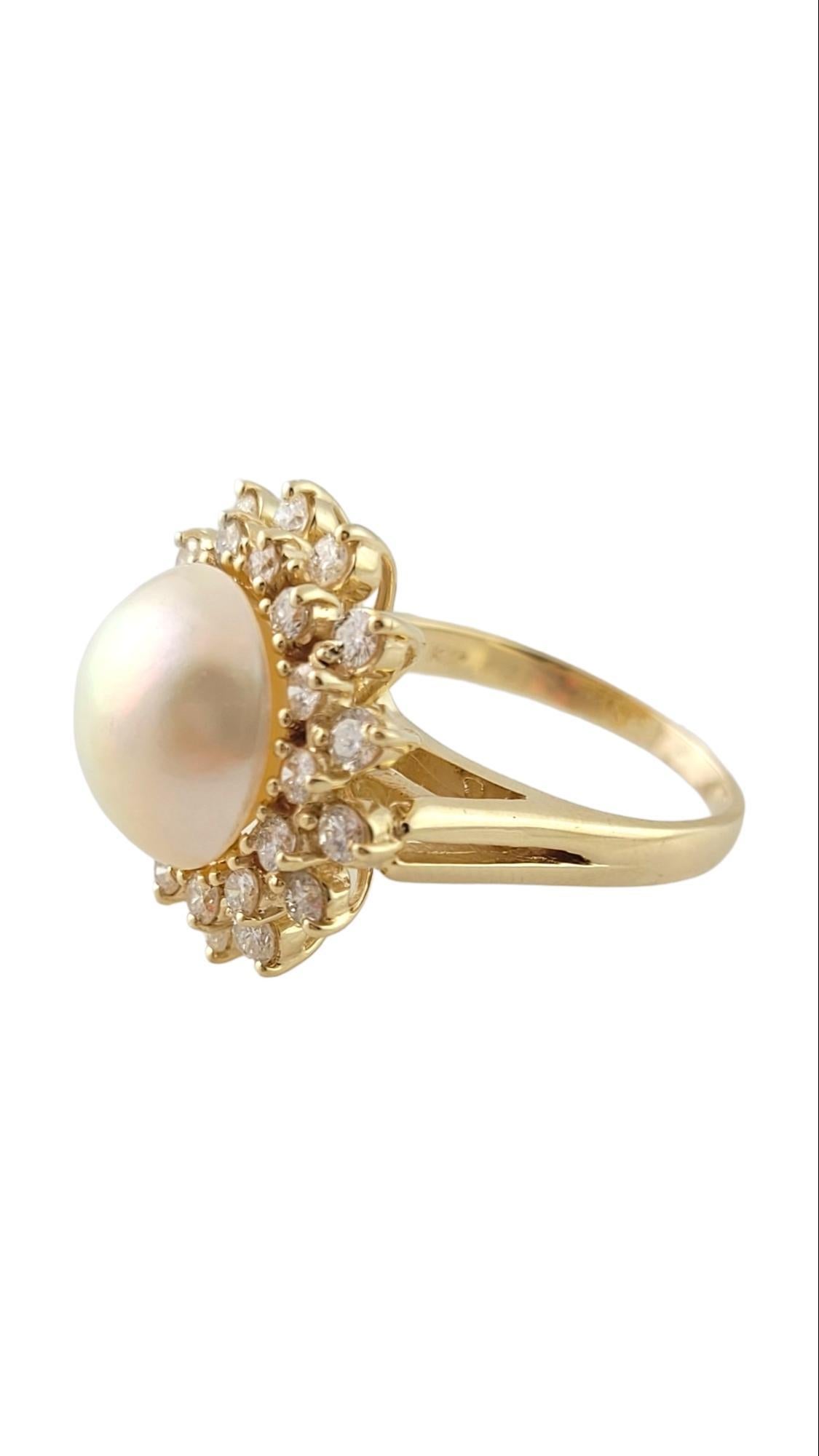 14 Karat Yellow Gold Cultured Mabe Pearl and Diamond Ring Size 8.25-

This stunning ring features one round Mabe pearl (14 mm) surrounded by 28 round brilliant cut diamonds set in classic 14K yellow gold. Width: 21 mm. Shank: 2 mm.

Total diamond