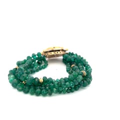 Bracelet 14K YG avec diamants ronds de 0.4 carat et émeraude de 4.24-7.25 MM