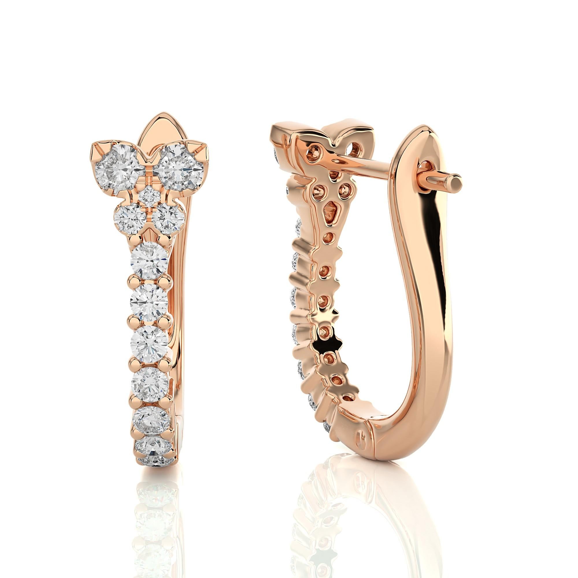 Modern Diamond And Pearl Huggie Earrings(0.31 Ct).

Within this cosmic duo, a row of diamonds with a butterfly design on the top aligns like twinkling stars in the night sky, flawlessly nestled in a classic 4-prong setting, embracing their