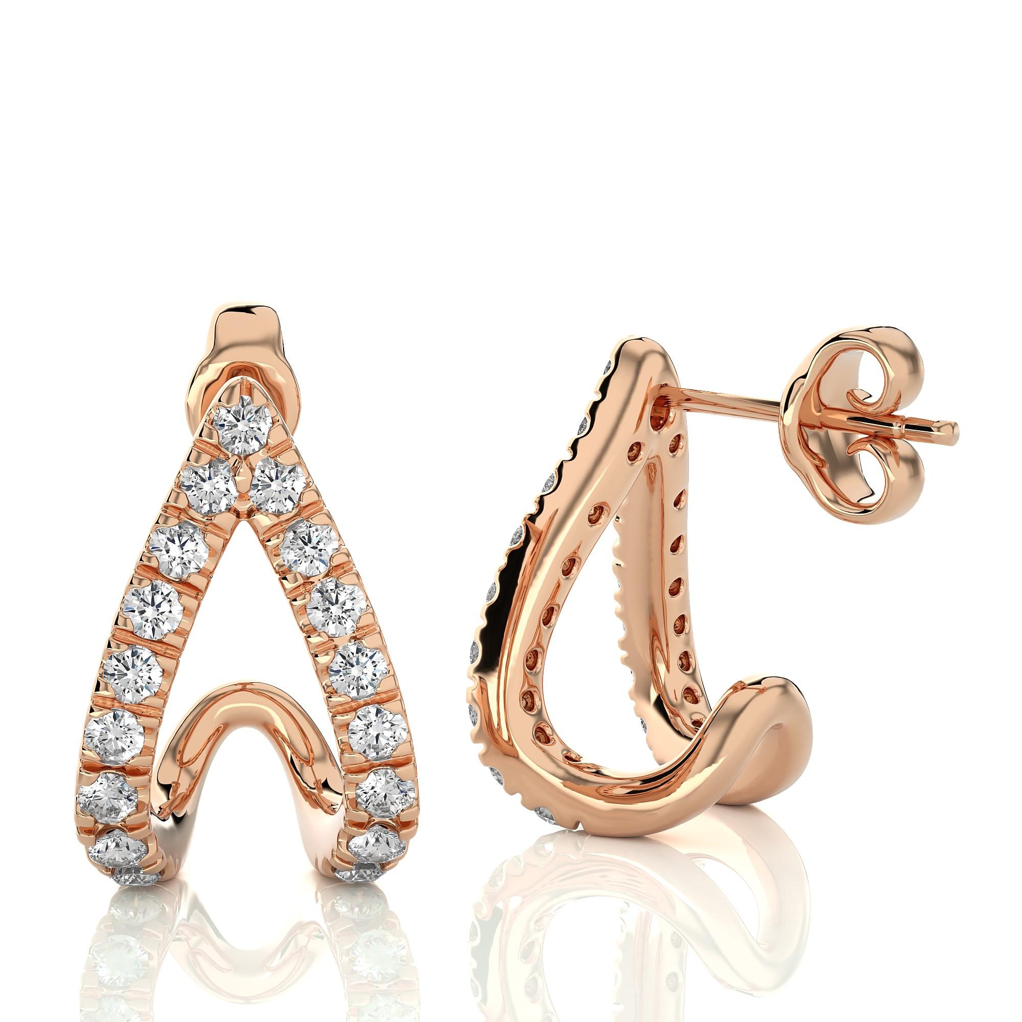 Modern Two-Row Split - Natural Earth-Mined Diamond Huggie Earrings. 

Aesthetically designed with a contemporary style which you can wear everyday. Featuring two rows of diamonds nestled securely in a classic 4-prong setting in 14K GOLD, with a