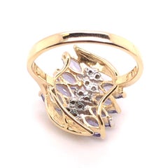 14kt 1.11ct Tanzanite and .10ct Diamond Ring