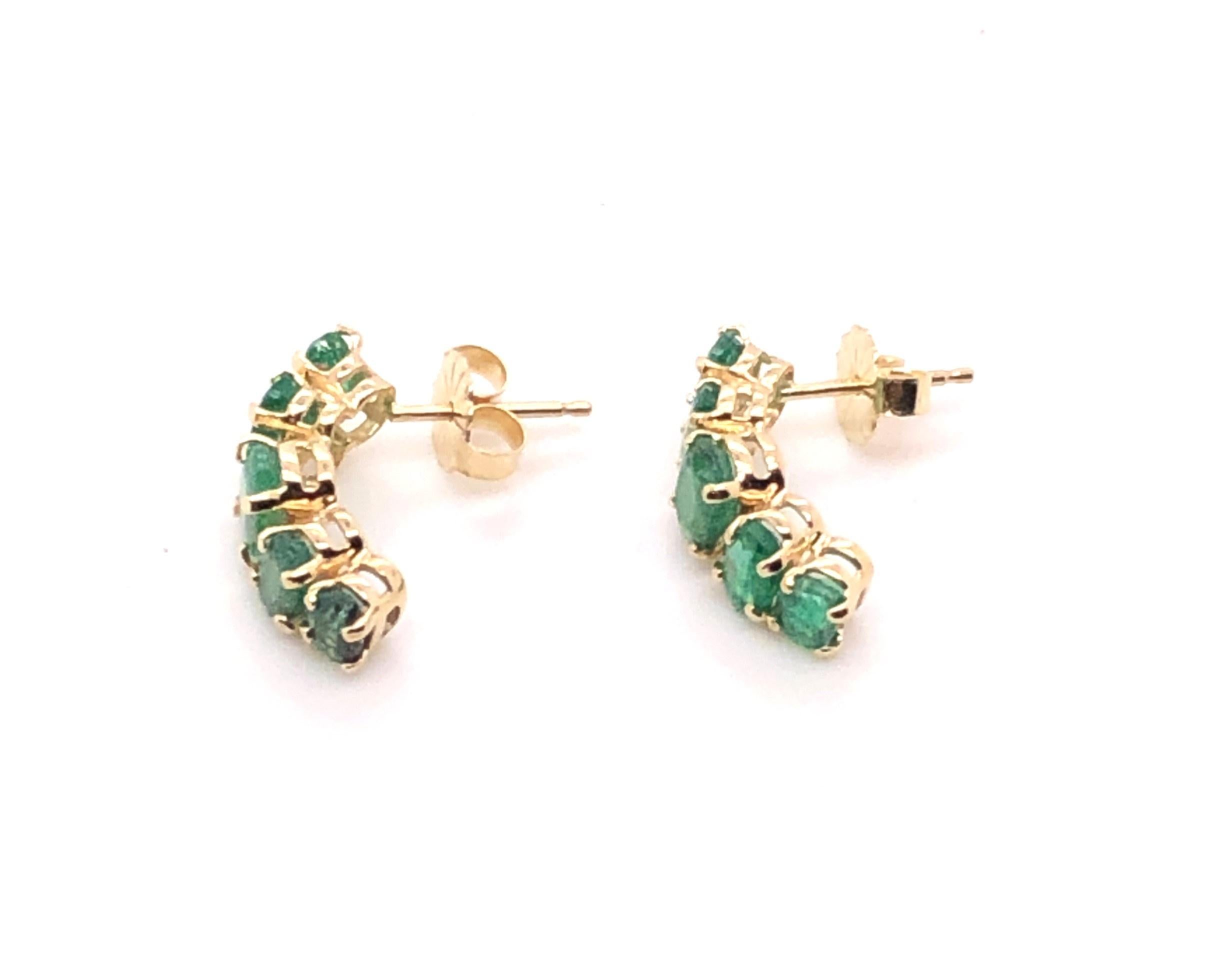 14kt yellow gold 5-stone approximately 2.10tcw  Emerald Post Back Earrings. These earrings are styled in a 