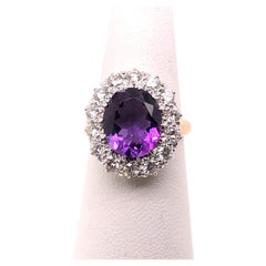 14kt 4.08ct Amethyst and 1.40ct Diamond Halo Ring