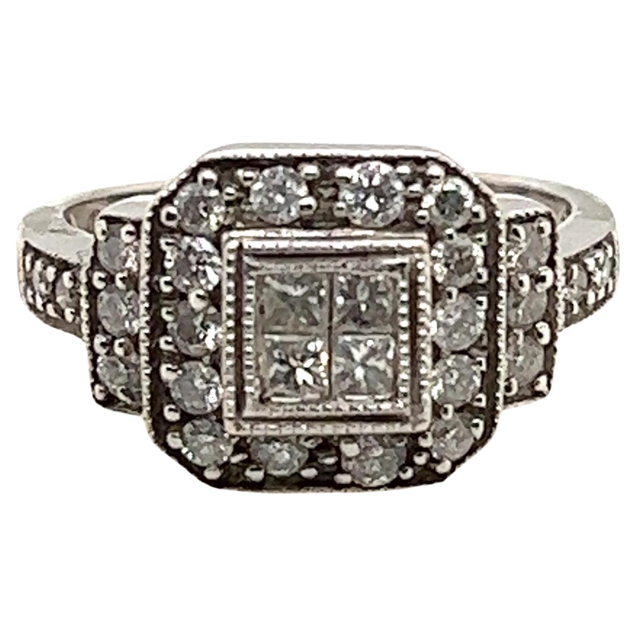 14kt .50 Carat Invisible Set Diamond Ring with Halo at 1stDibs