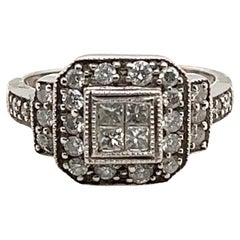 14kt .50 Carat Invisible Set Diamond Ring with Halo