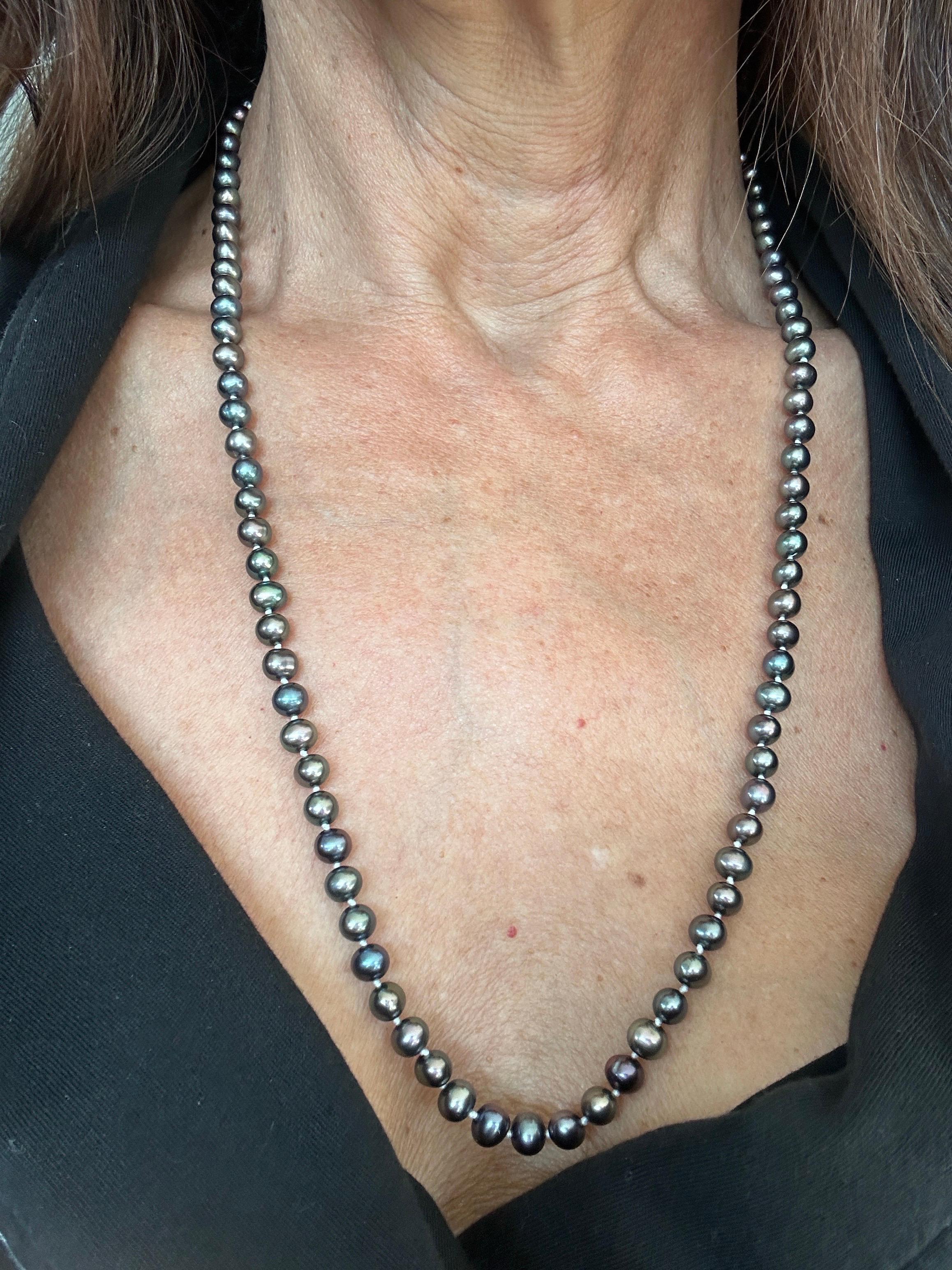 14kt 5,5 mm Tahiti-Zuchtperlen Blau/Lila 22