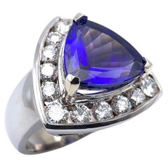 14KT 7,63 CT Trillion Tansanit und Diamant Halo-Ring