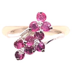 14kt .85ct Ruby and .05ct Diamond Double Flower Ring