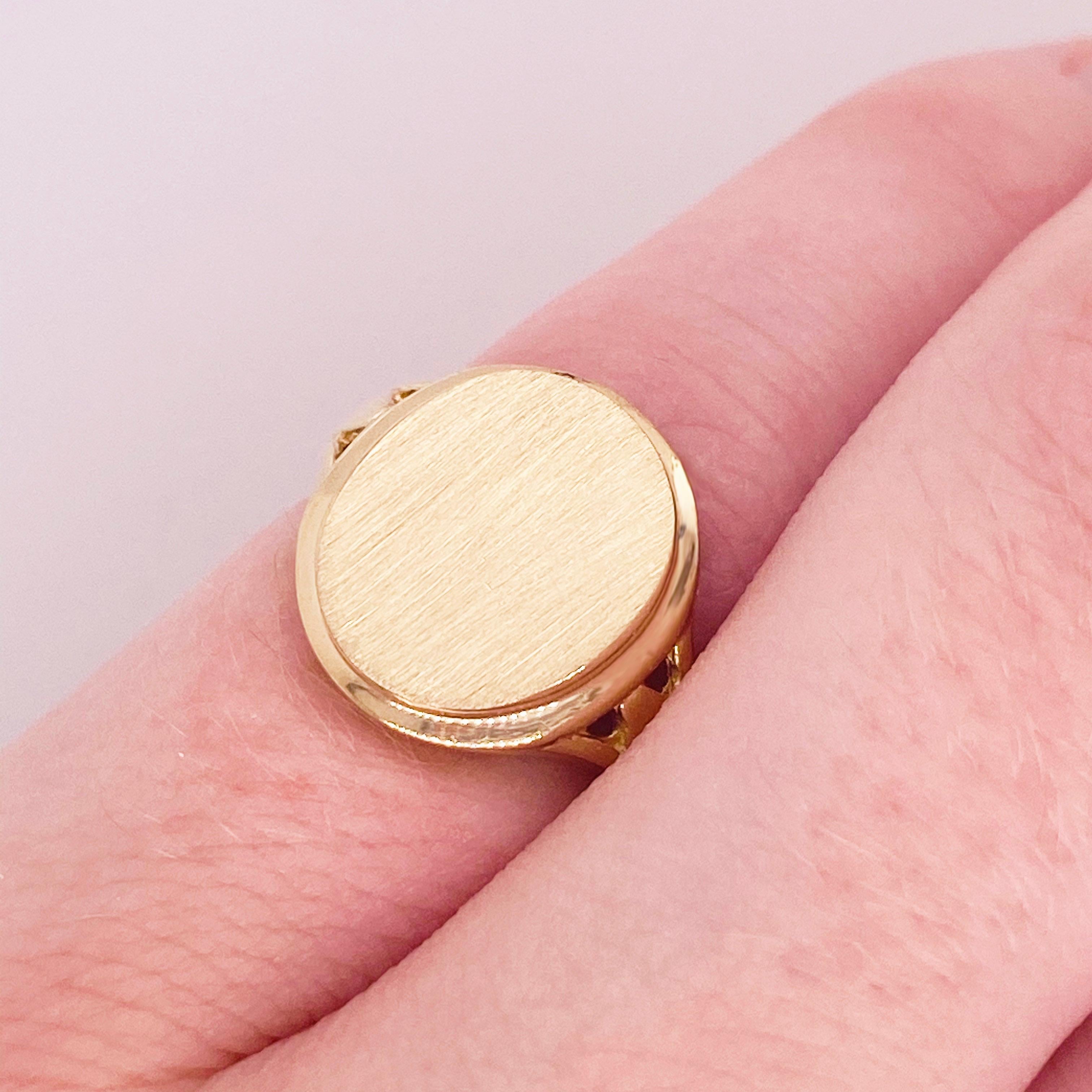 This pinkie ring is oh so cute and clever!  Designed to be on your pinkie, you can have it engraved with initials, your monogram, the perfect name, or flush-set a favorite gemstone in it!  This signet ring is solid 14k Yellow Gold and made in a well