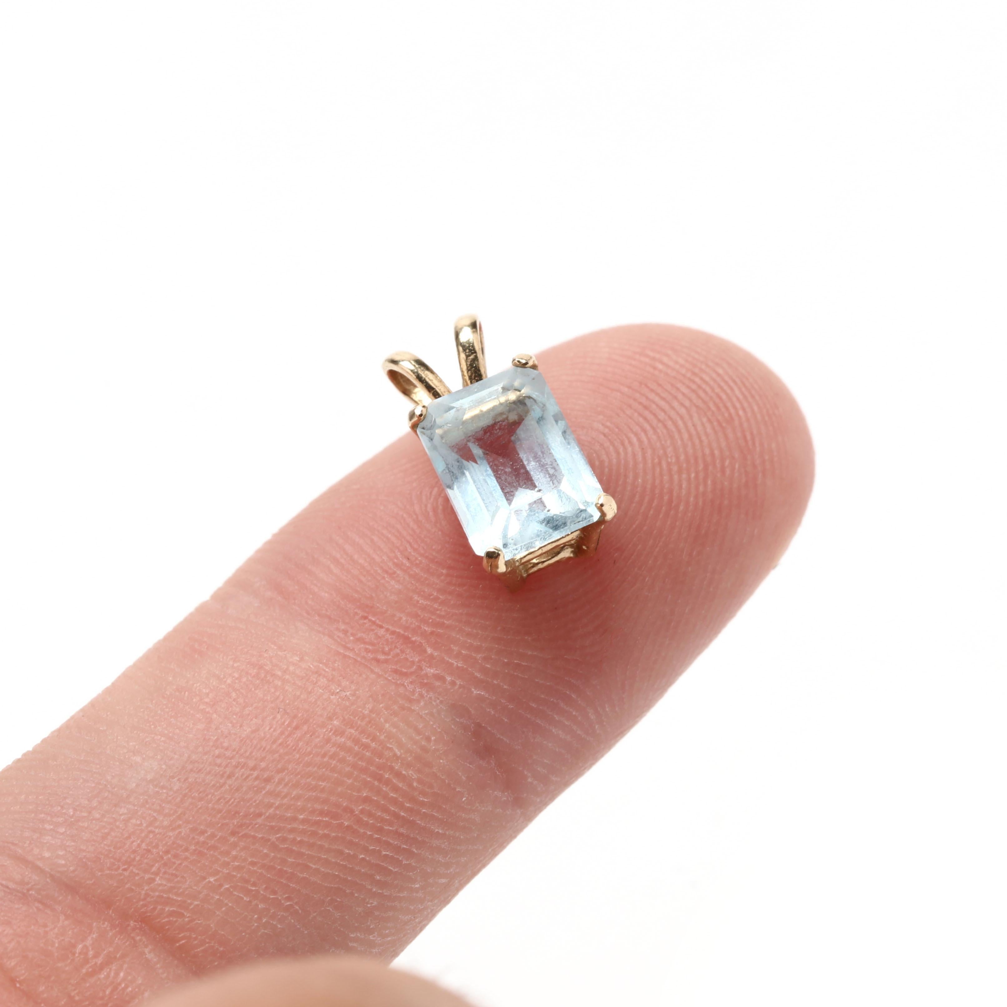 Women's or Men's 14KT Emerald Cut Blue Topaz Solitaire Pendant