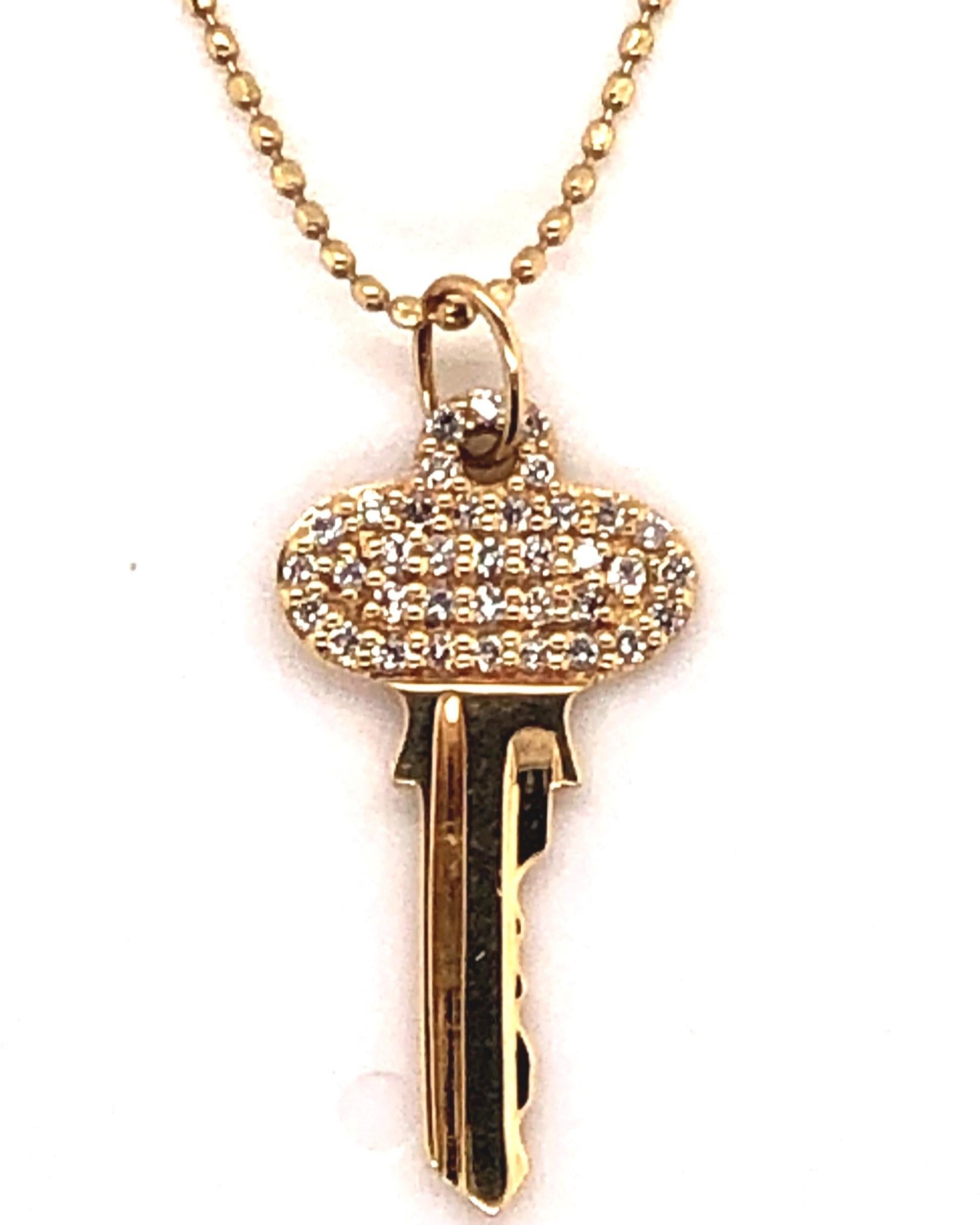 All of these items, the bee, the key, the snake and the necklace chain itself are from Sydney Events collection. All individual items are 14kt yellow gold. The Key contains diamonds, the bee contains white and black diamonds and the snake contains