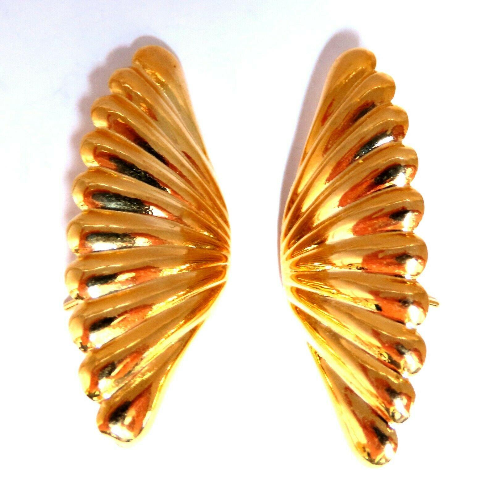 Angel Wing Stud Earrings

Measurements of Earrings:

33 x 12mm

1.4 grams / 14kt. yellow gold

Earrings are gorgeous made