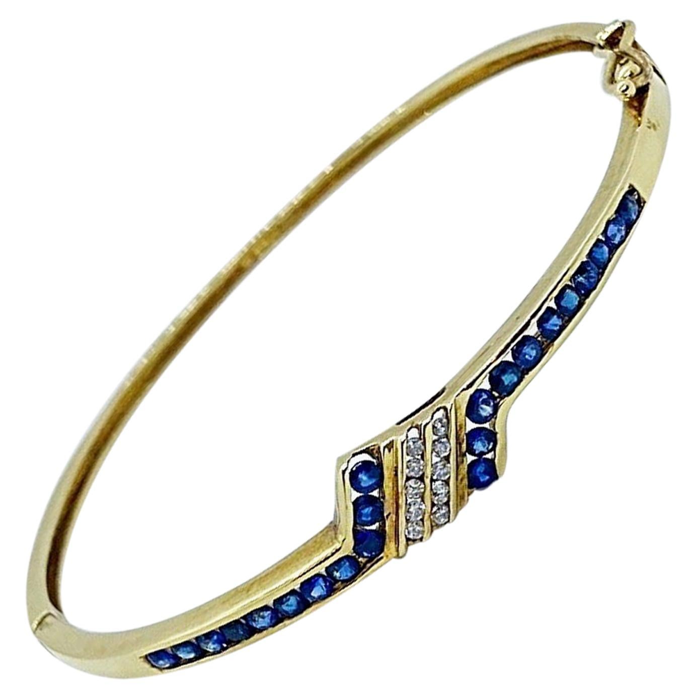 14KT Gold Bangle Bracelet with 1.15 Carat Blue Sapphires and .20 Carat Diamonds