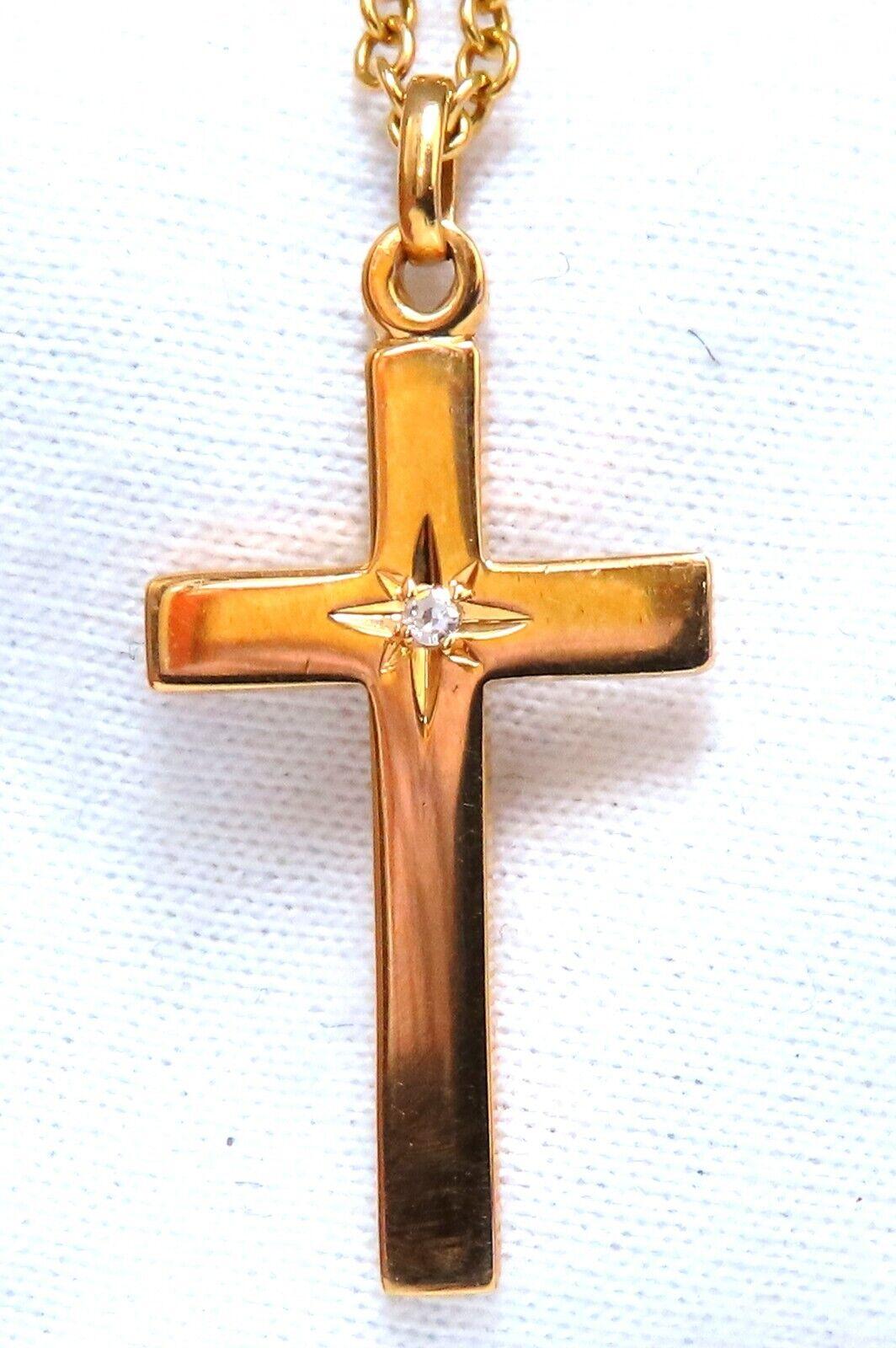 Midsize Gold cross pendant

.05ct diamond

H-color Vs-2 clarity

14kt. Yellow gold. 4.8grams.

cross total measurement: 23 x 14mm 

Necklace: 14 inch 

14kt yellow gold