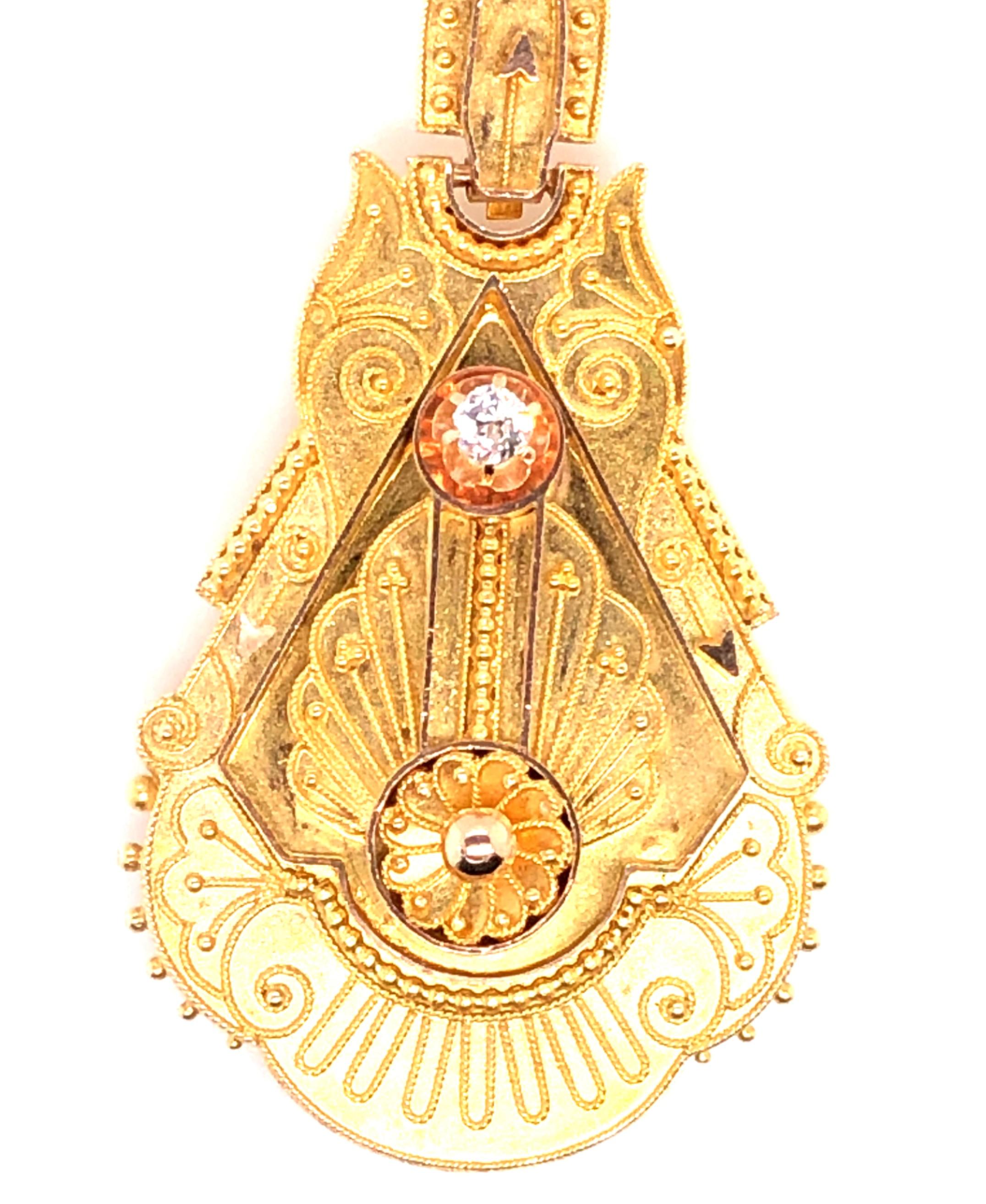 14kt yellow and rose gold Etruscan Revival locket. The Victorian era was filled with various revival movements where ancient styles were given a new sense of fashion. This Etruscan Revival locket is one of those, based on the archaeological finds