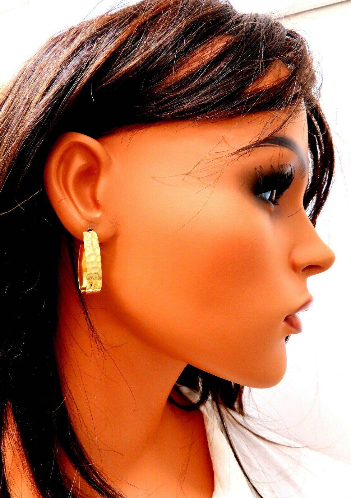 Classic Semi-Hoop Earrings

Measurements of Earrings:

29mm diameter

7.8mm Wide-Flat.

4.5 grams / 14kt. Yellow gold

Earrings are gorgeous made