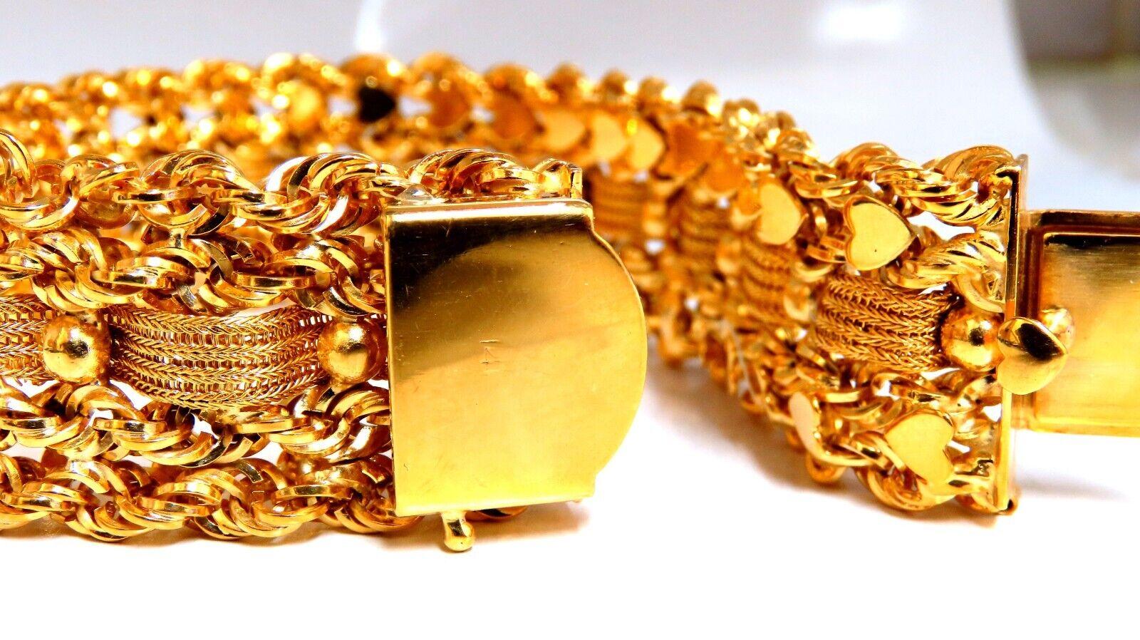 Bracciale vintage con corda e rete a cuore

Incredibili dettagli intricati

Diametro 22 mm

Oro giallo 14 carati 87,5 grammi

Il bracciale misura 7,5 pollici

Serratura sicura e scatto