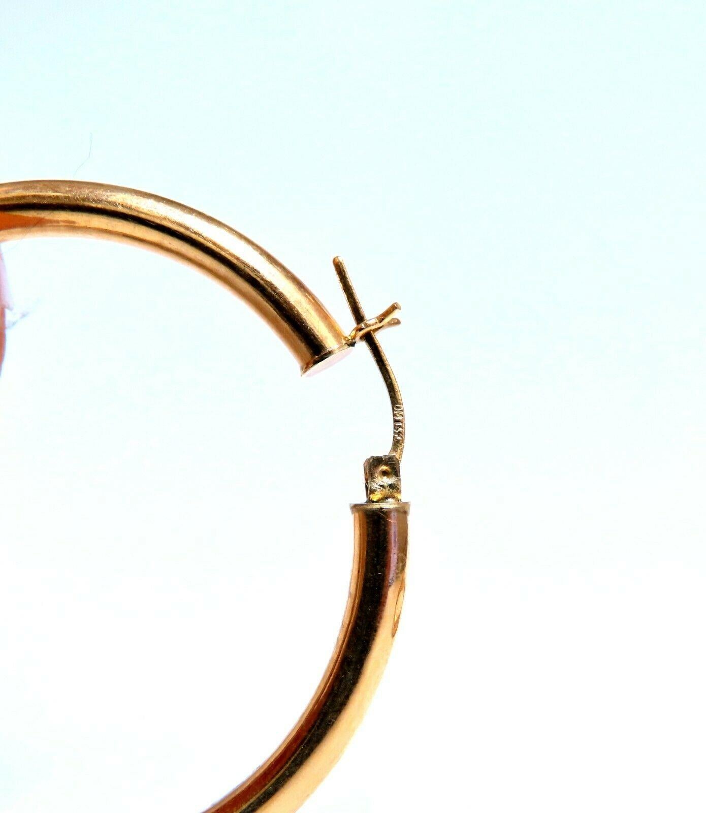 Gold Hoop Earrings

Measurements of Earrings:

47mm diameter / 1.85 inch

4mm wide.

5.8 grams / 14kt. yellow gold

Earrings are gorgeous made