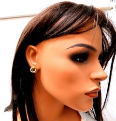 Pendientes trenzados entrelazados de oro de 14 quilates