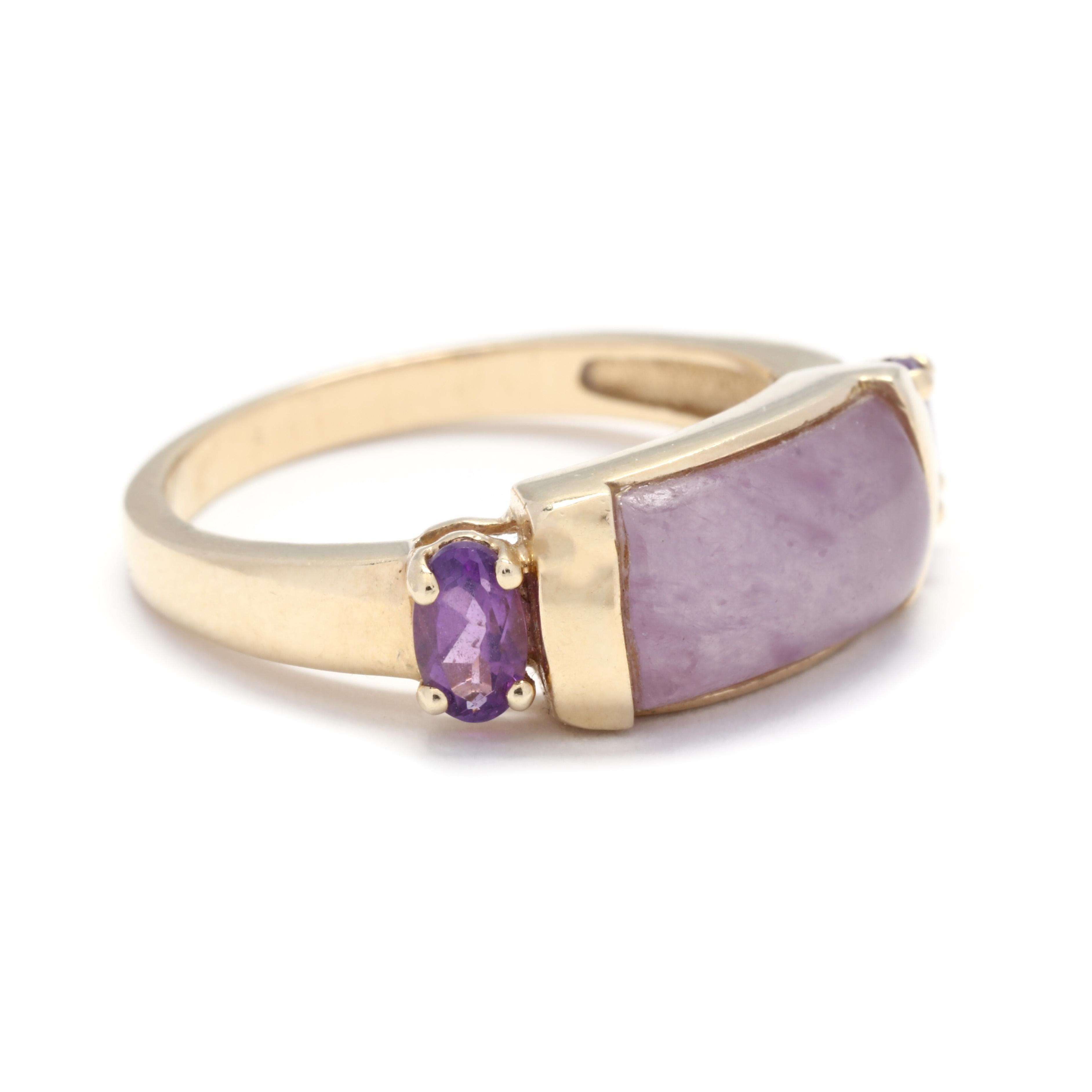 A vintage 14 karat yellow gold lavender jade and amethyst band ring. This ring features a cabochon rectangular lavender jade center stone with a prong set oval cut amethyst stone to either side and a slightly tapered band.



Stones:

- lavender