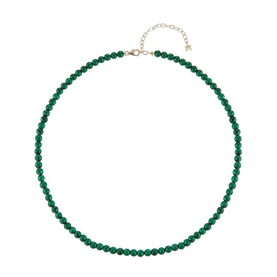 Beautifully made of 14kt yellow gold and strung with vibrant malachite beads. This necklace is perfect all year round. Looks fantastic worn alone or layered. 