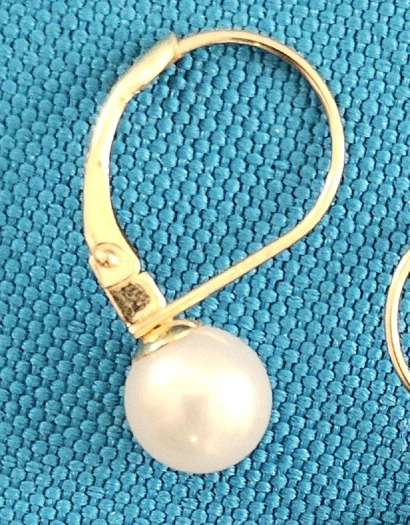 Orecchini in oro 14KT e perle, con timbro .585, orecchini a buco in oro vintage.  
Ecco un paio di orecchini d'oro con la scritta zz e .585 all'interno dei fili. Dato che .585 indica l'oro 14kt, presumiamo che anche le perle siano vere.
DI SEGUITO
