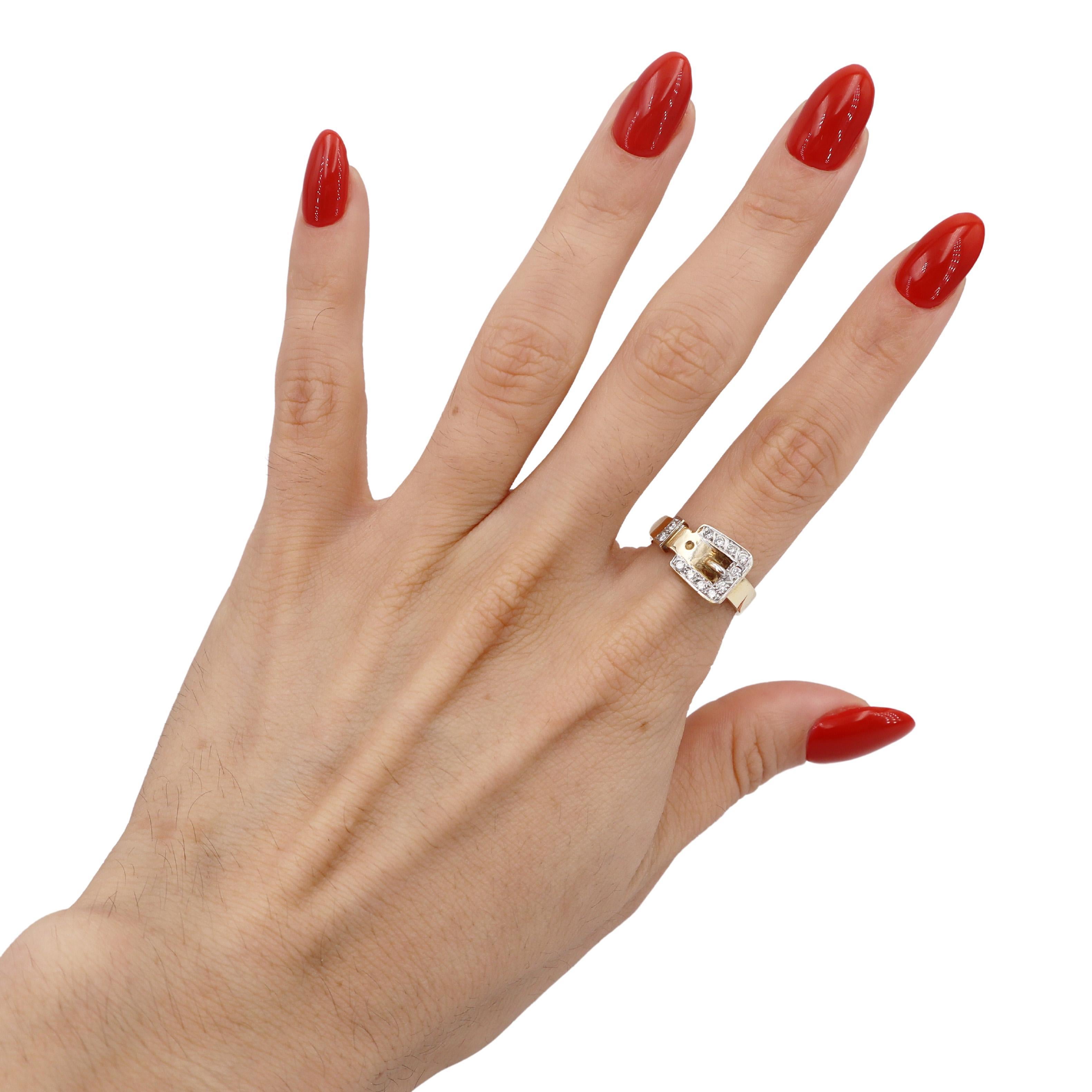 Charming 14kt yellow and white Gold Belt Ring featuring 12 Round cut Diamonds weighing together Approx. 0.12 carats. Graded colorless.

This delightful 14kt yellow and white gold belt ring is a stunning piece that beautifully combines elegance and