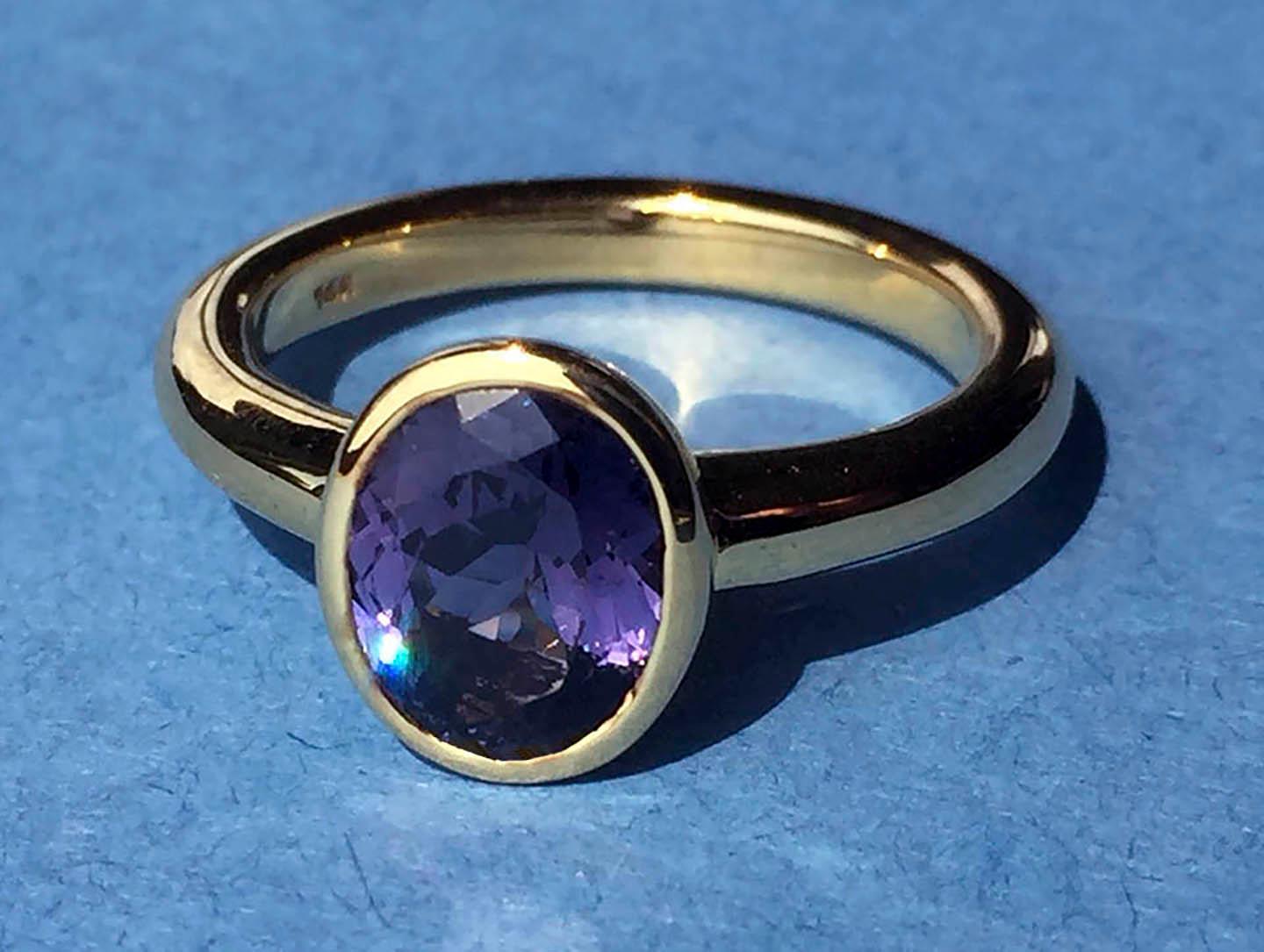 A 14kt Gold Ring with a 1.3 Carat Oval Purple Spinel. Gold weight is 5.2 Grams, Ring Size is 6 USA

Originally from San Diego, California, Kary Adam lived in the “Gem Capital of the World” - Bangkok, Thailand, sourcing local gem stones and working