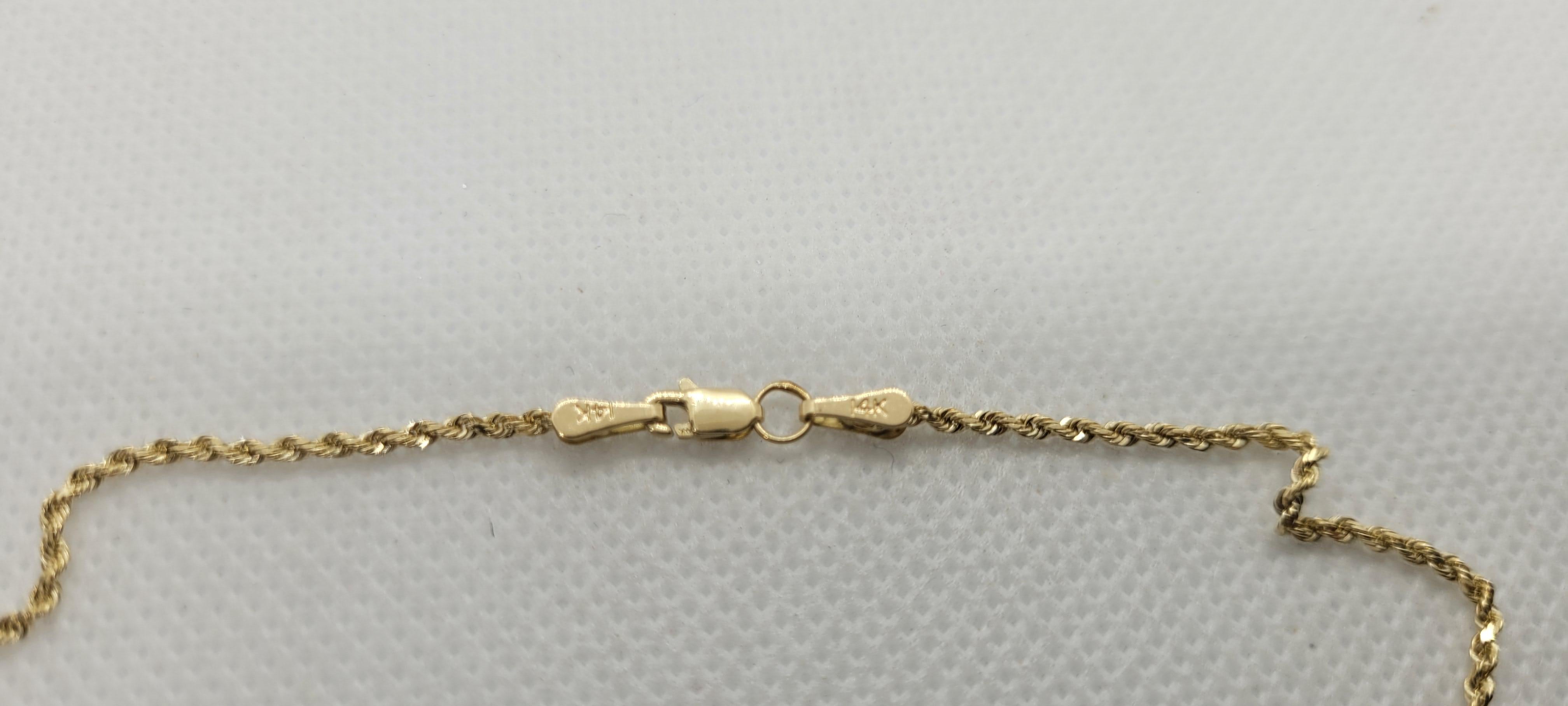 La chaîne en or jaune 14kt de Bailey Banks & Biddle, d'une longueur de 20 pouces et d'un diamètre de 1,6 mm, est un must pour tout amateur de bijoux. La chaîne est fixée à l'aide d'un solide fermoir à mousqueton et pèse confortablement 4,8 grammes.