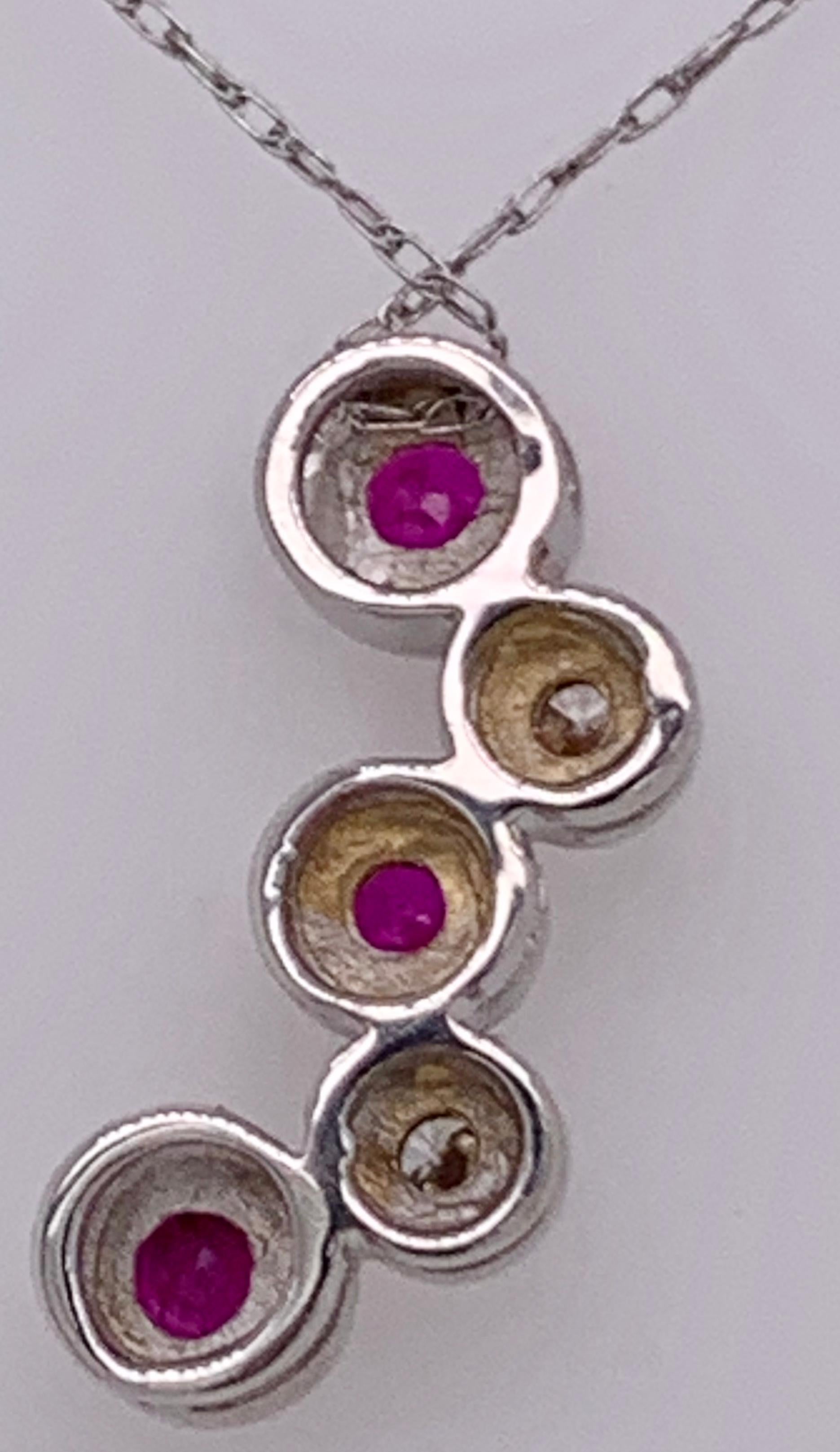 14kt Gold Ruby and Diamond Necklace Having 3 Rubies and 2 Round Diamonds For Sale 3