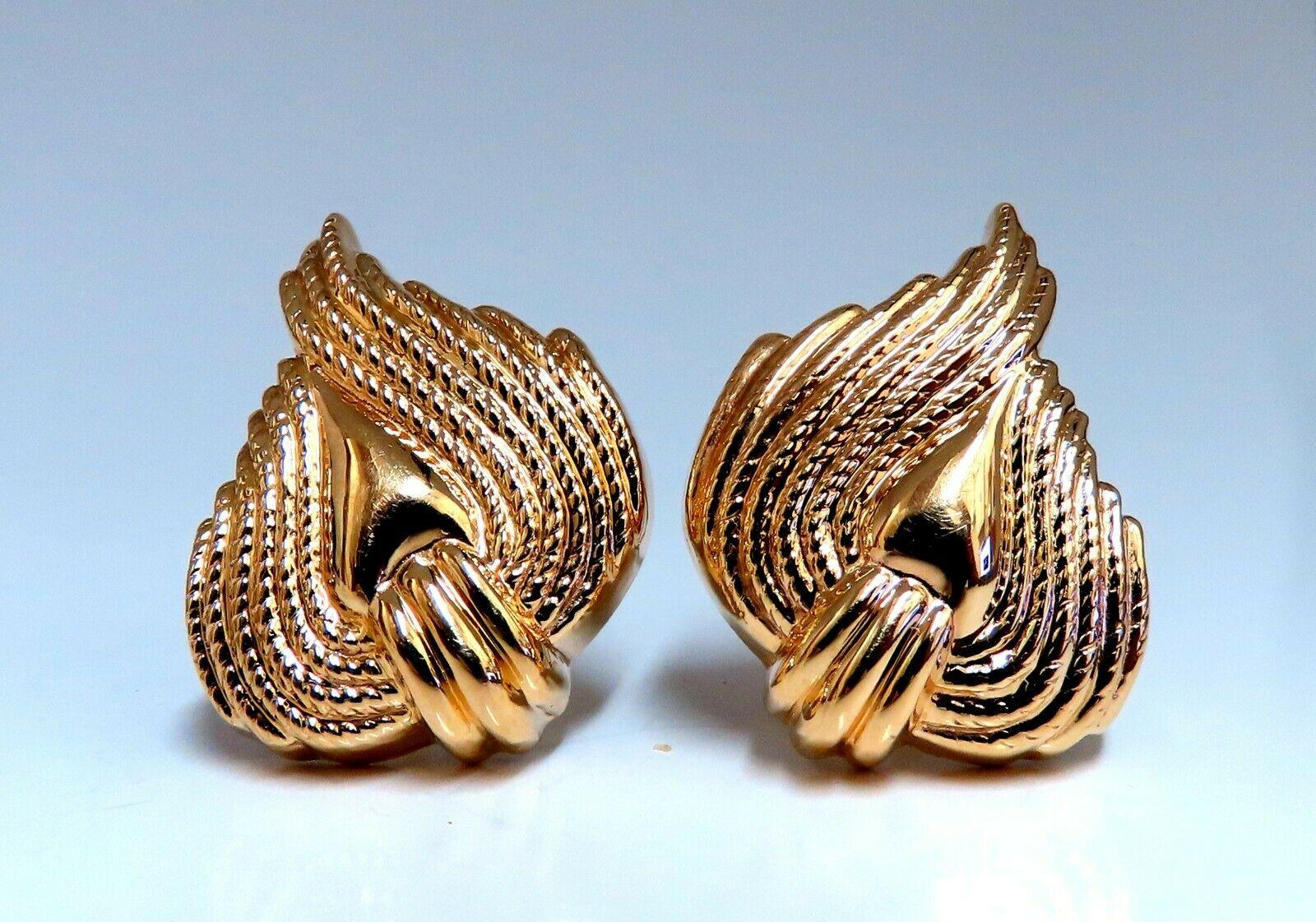 Flaming Textured Earrings 

Measurements: 

1.1 x .90 Inch

Depth: .27inch

Comfortable Omega Clips

9.3 grams / 14kt. Yellow Gold

Earrings are gorgeous made