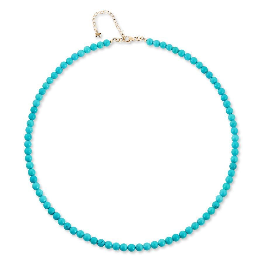Beautifully made of 14kt yellow gold and strung with vivid blue turquoise beads. This necklace is perfect all year round. Looks fantastic worn alone or layered. 