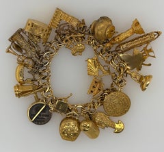 14kt Gold Weltreisender Charme Armband, 1950er Jahre,  22 Reize