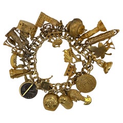 Bracelet à breloques World Traveler en or 14kt, années 1950,  22 charmes