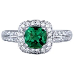 14kt Green Stone Solitaire and Diamond Halo Ring White Gold