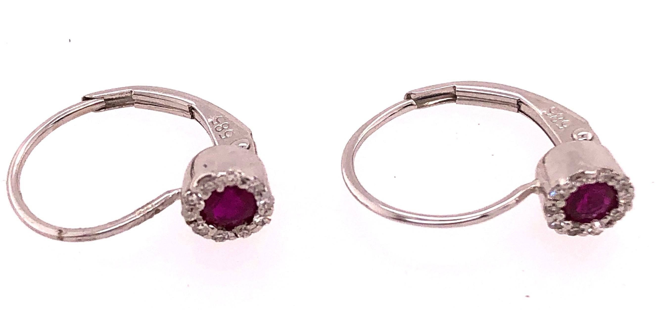 Round Cut 14 Karat Lever Back Pink Topaz with Diamond Earrings For Sale