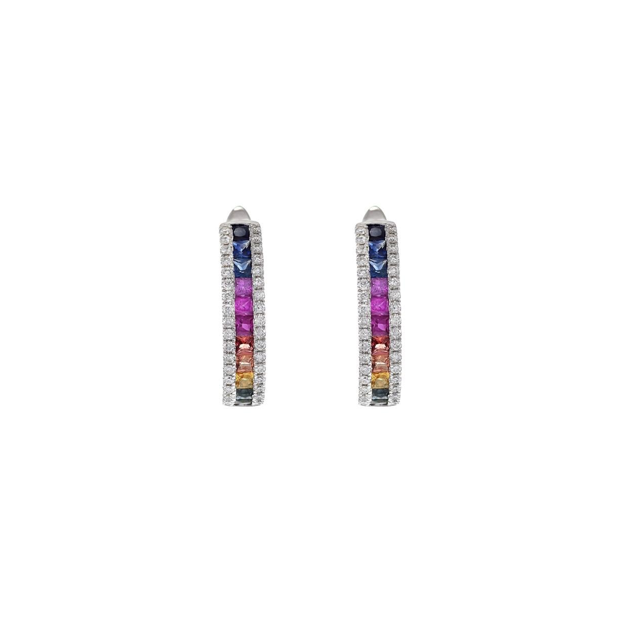 These 14kt U-shaped huggie earrings boast a delightful arrangement of multi-color princess-cut sapphires, totaling 1.43 carats. These sapphires are skillfully channel-set between two rows of round-cut diamonds, with a combined weight of 0.41 carats.