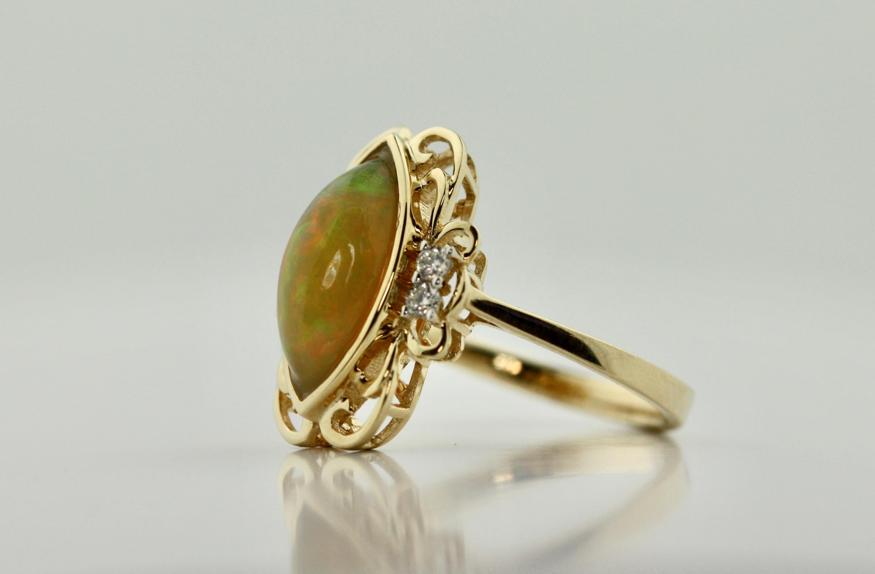 14 Karat Opal and Diamond Ring 1