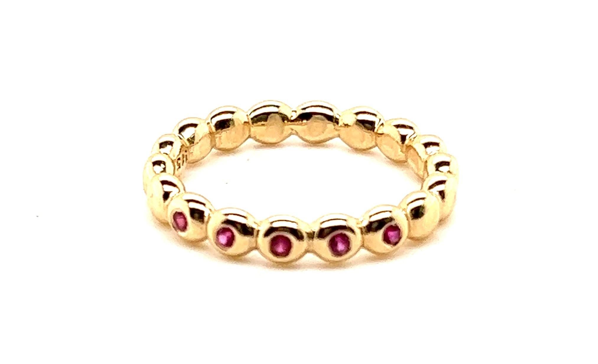 14KT yellow gold Pandora Bubble Ring with approximately .10-.15TCW Rubies.
The ring is a finger Size 7 and is a very nice, thick, comfortable band measuring 3.37mm x 2.50mm.
This is a great stackable band. 