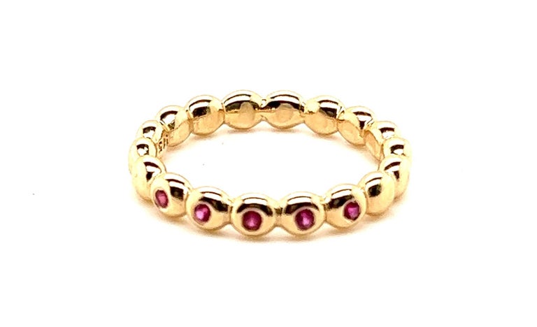 14KT yellow gold Pandora Bubble Ring with approximately .10-.15TCW Rubies.
The ring is a finger Size 7 and is a very nice, thick, comfortable band measuring 3.37mm x 2.50mm.
This is a great stackable band. 
