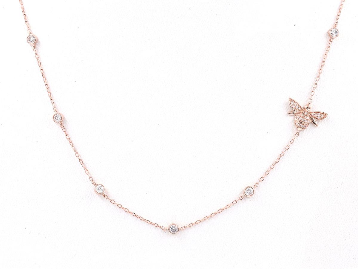 Contemporaneo Collana con farfalle in oro rosa 14KT e pietre pavé