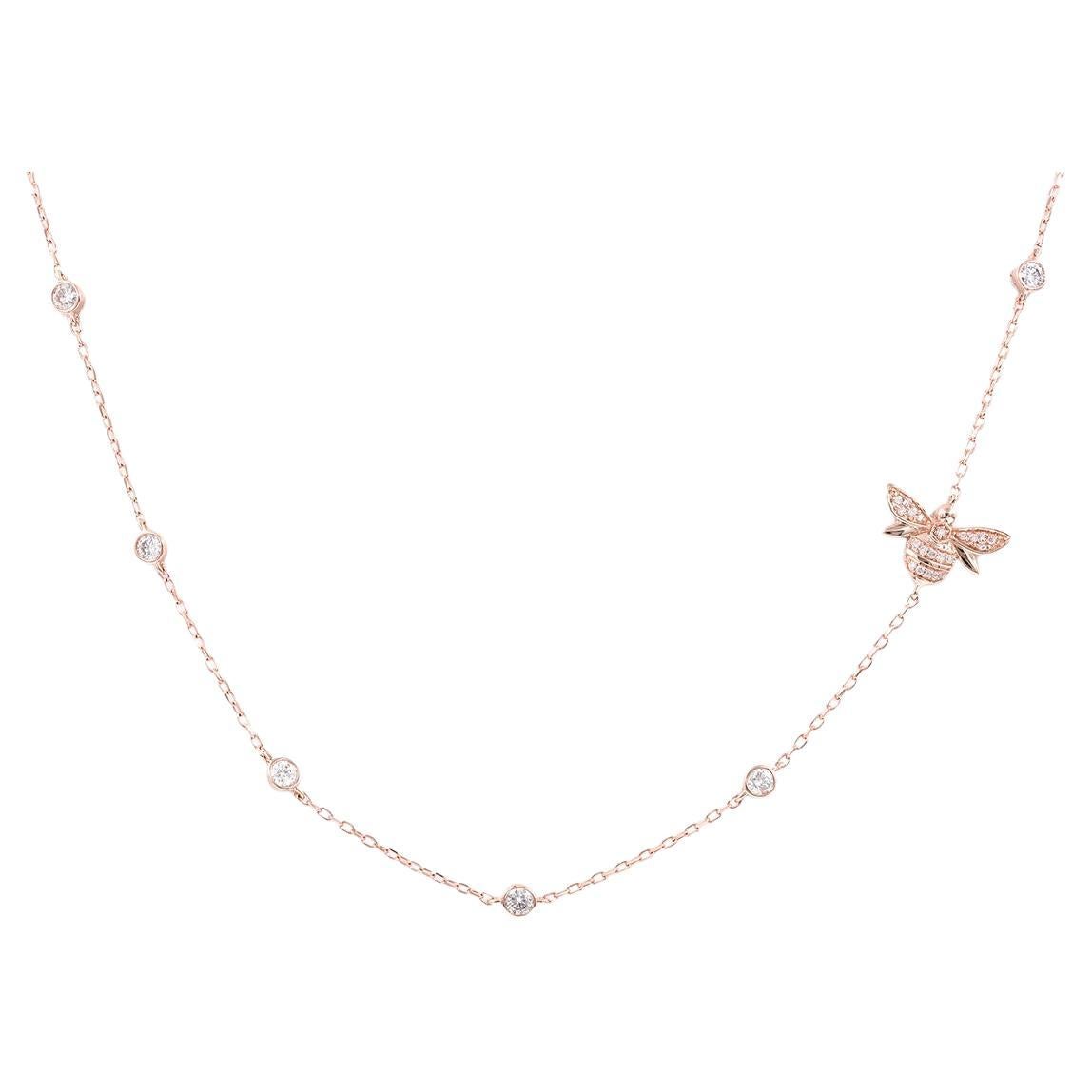 Collana con farfalle in oro rosa 14KT e pietre pavé".