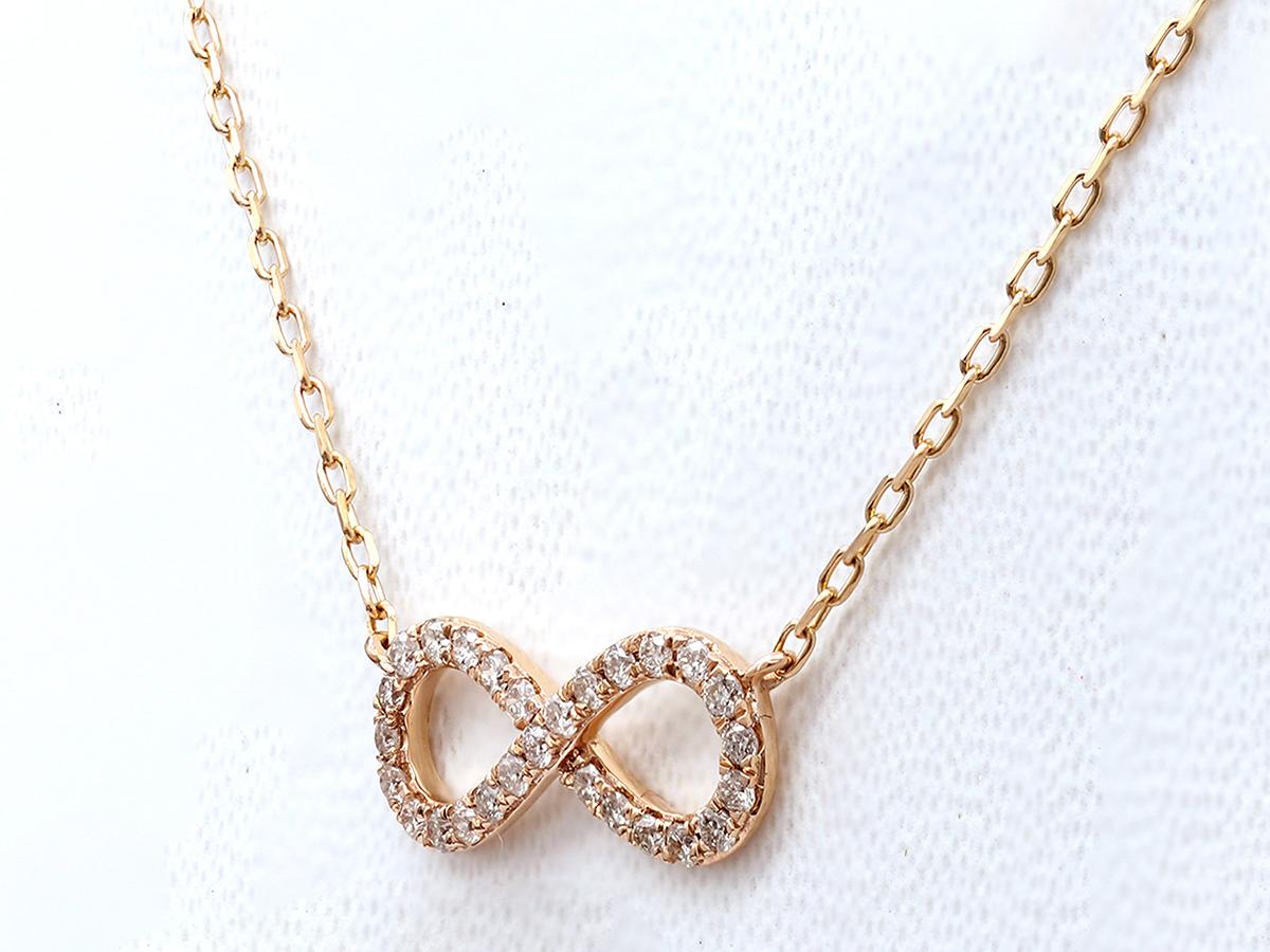 Taille brillant Collier à pendentif infini en or rose 14KT et diamants en vente