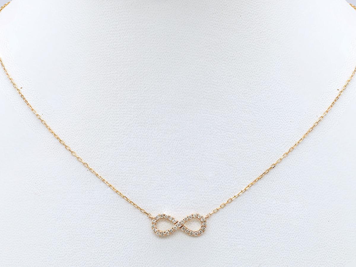 Collier à pendentif infini en or rose 14KT et diamants Neuf - En vente à Antwerp, BE
