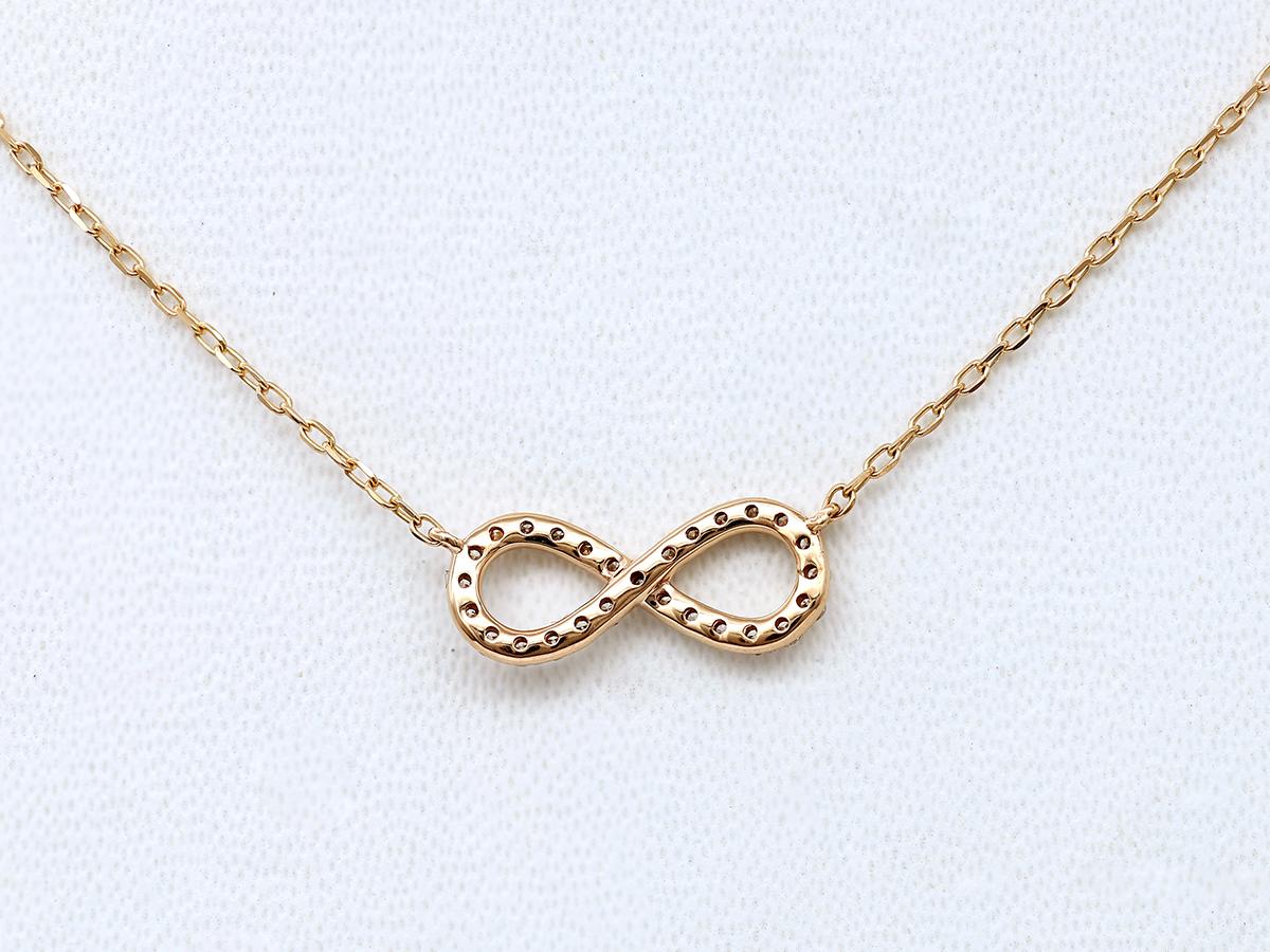 Collier à pendentif infini en or rose 14KT et diamants Pour femmes en vente